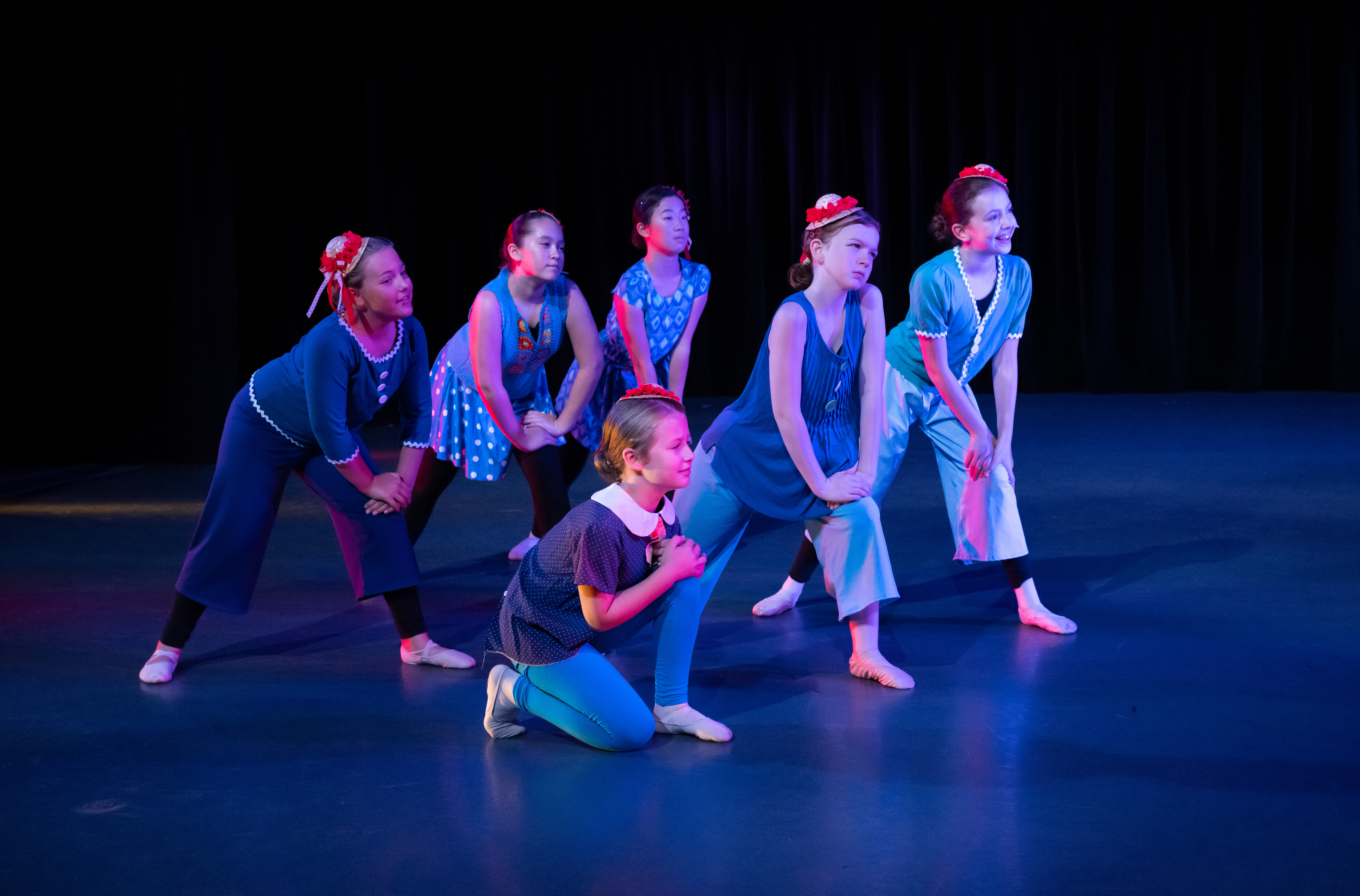 Wendy Park helping a student at the barre at Dance Center Evanston